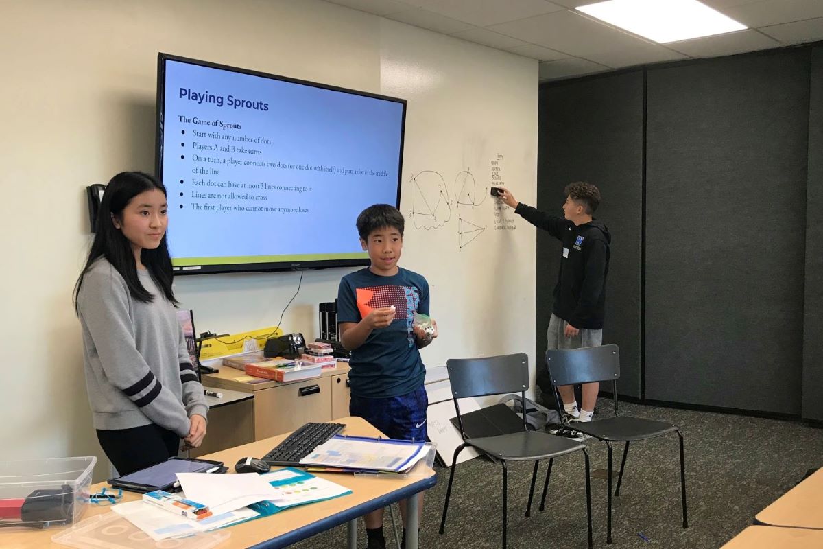 A student helps with a review session